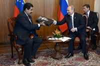 Vladimir Putin da Rússia tem sido um dos principais defensores do governo Maduro a nível internacional